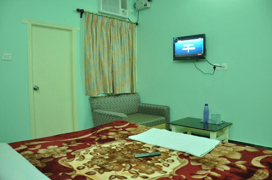 Hotel Kiran Palace Варанаси Номер фото